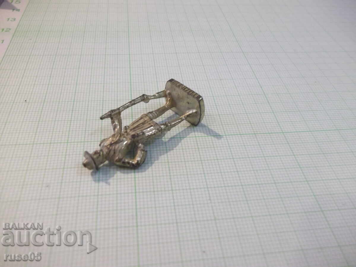 Auction  Small metal figurine