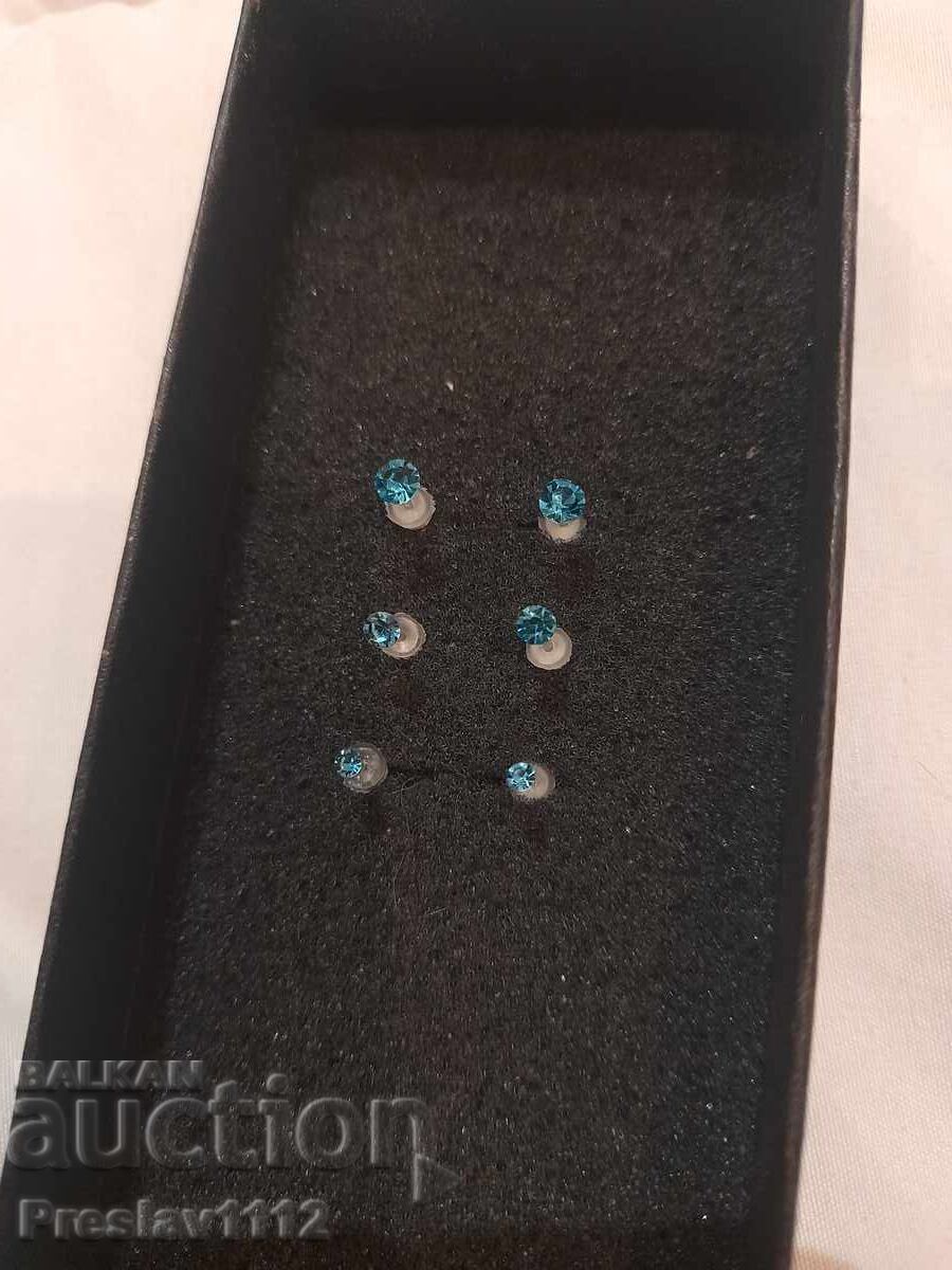 Lot of Piercing Earrings with Blue Zircons