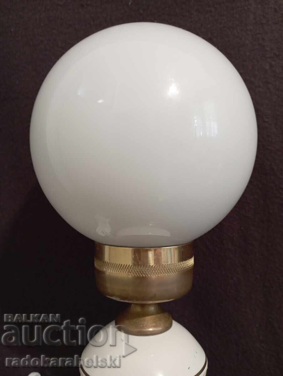 Delivery of Two brass and porcelain lamps with white glass shades
