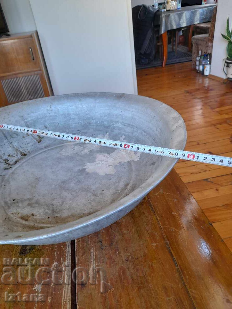 Delivery of Old aluminum pot