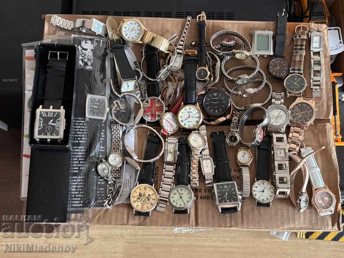 Παρτίδα καινούργια και μεταχειρισμένα ρολόγια χειρός, ανδρικά και γυναικεία