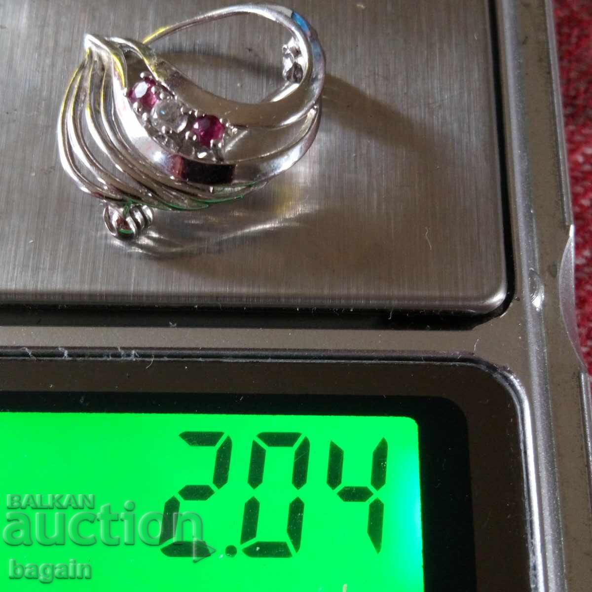 Auction  Brooch with rubies