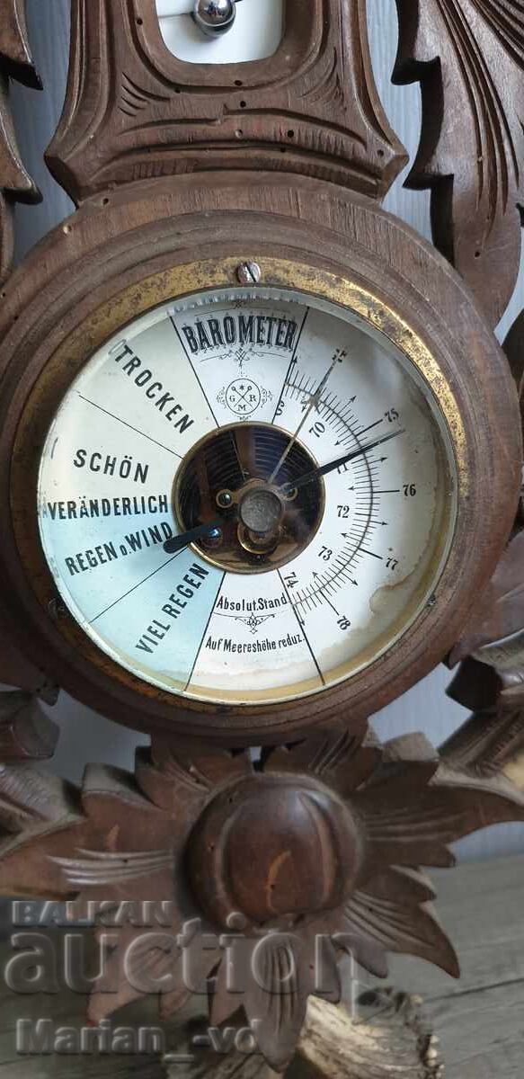 Delivery of Old wooden barometer decorated with deer antlers