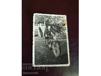 Lady with a motorcycle in a yard - 1954 (V. Tarnovo)