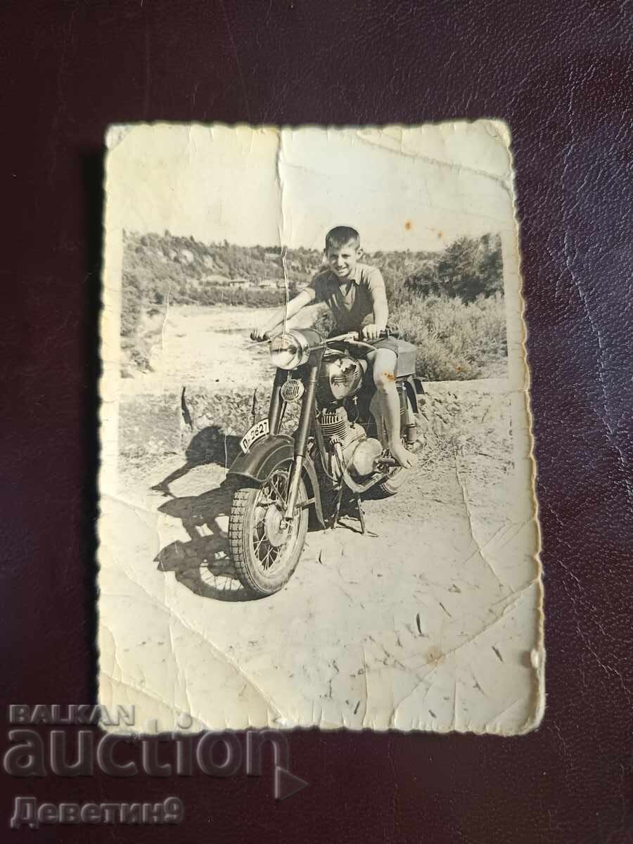 Child with a motorcycle outdoors - 1960 (Veliko Tarnovo region) Child with a motorcycle outdoors - 1960 (Veliko Tarnovo region)