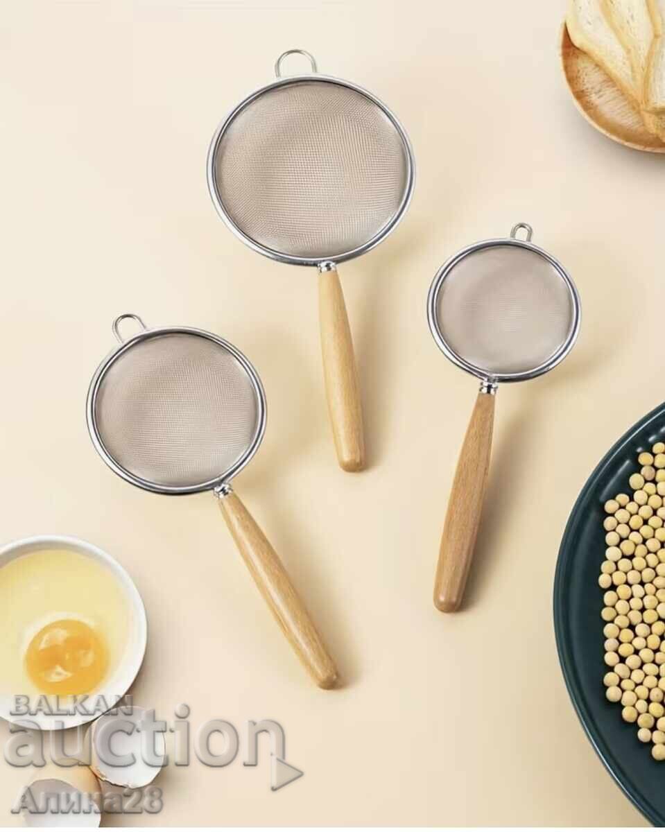Strainer with a wooden handle