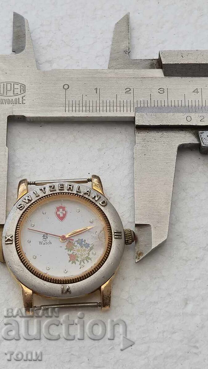 Delivery of SWITZERLAND QUARTZ SWISS MADE RARE I DON'T KNOW IF IT WORKS
