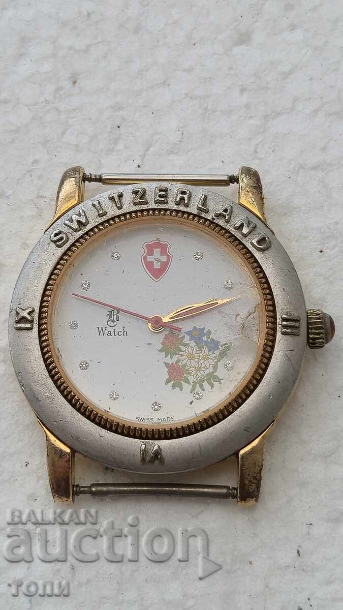 SWITZERLAND QUARTZ SWISS MADE RARE I DON'T KNOW IF IT WORKS