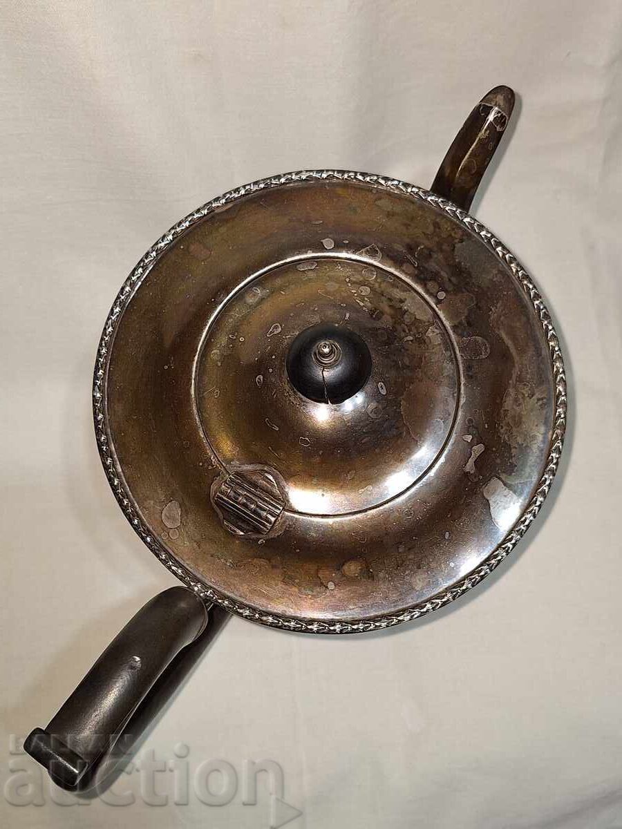 Auction  Antique silver teapot