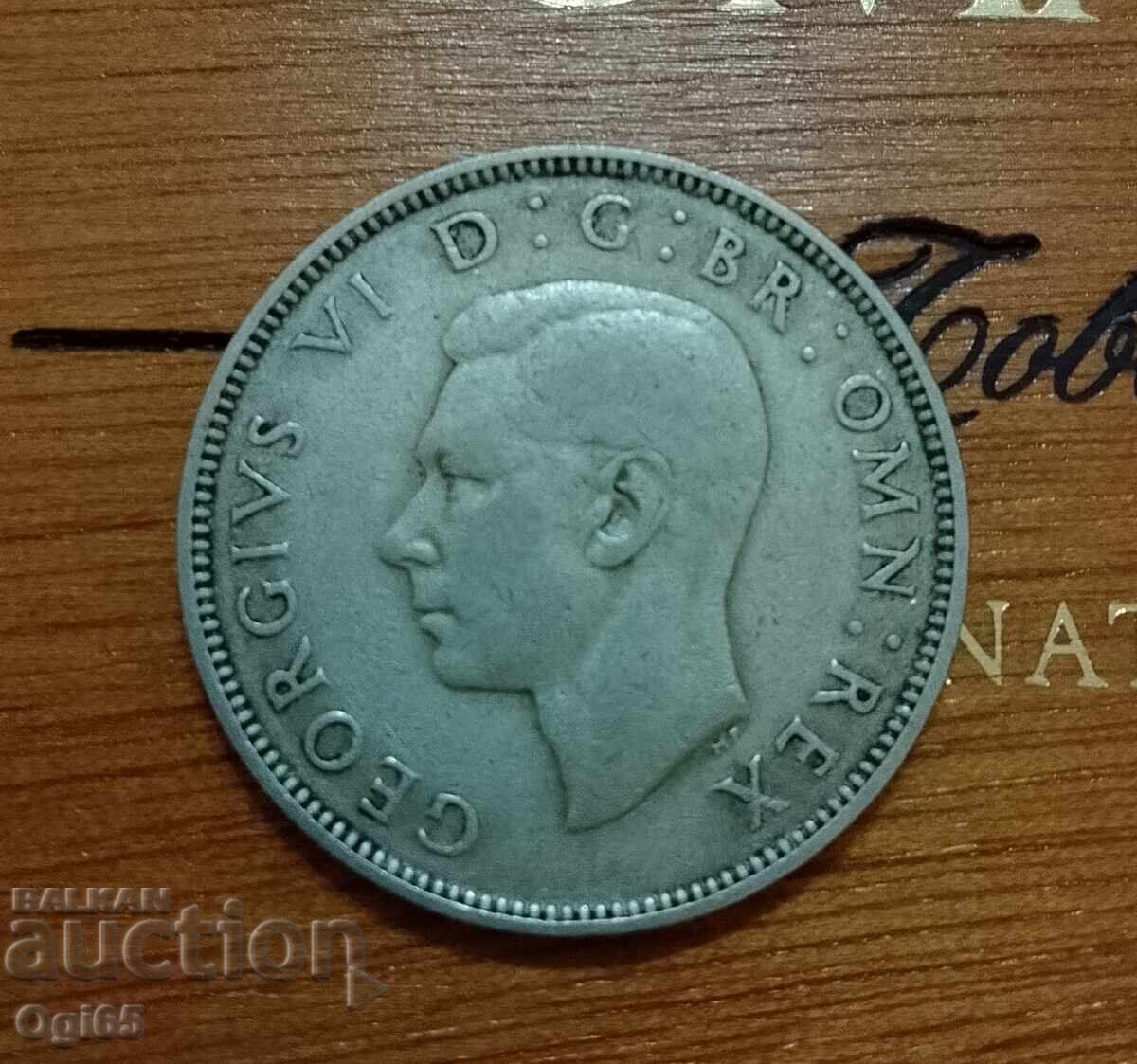 Monedă veche din argint din Marea Britanie doi șilingi din 1941 cu preț € 12.00 | 23.47 BGN Monedă veche din argint din Marea Britanie doi șilingi din 1941 cu preț € 12.00 | 23.47 BGN