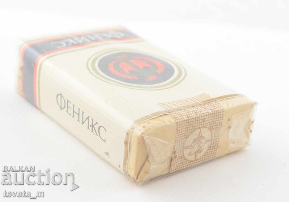 Auction PHOENIX cigarettes, sealed with cellophane and a social banderole Auction PHOENIX cigarettes, sealed with cellophane and a social banderole