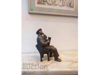 Sculpture of a man playing the saxophone
