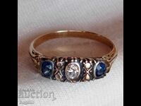 Silver ring with sapphires and gold plating