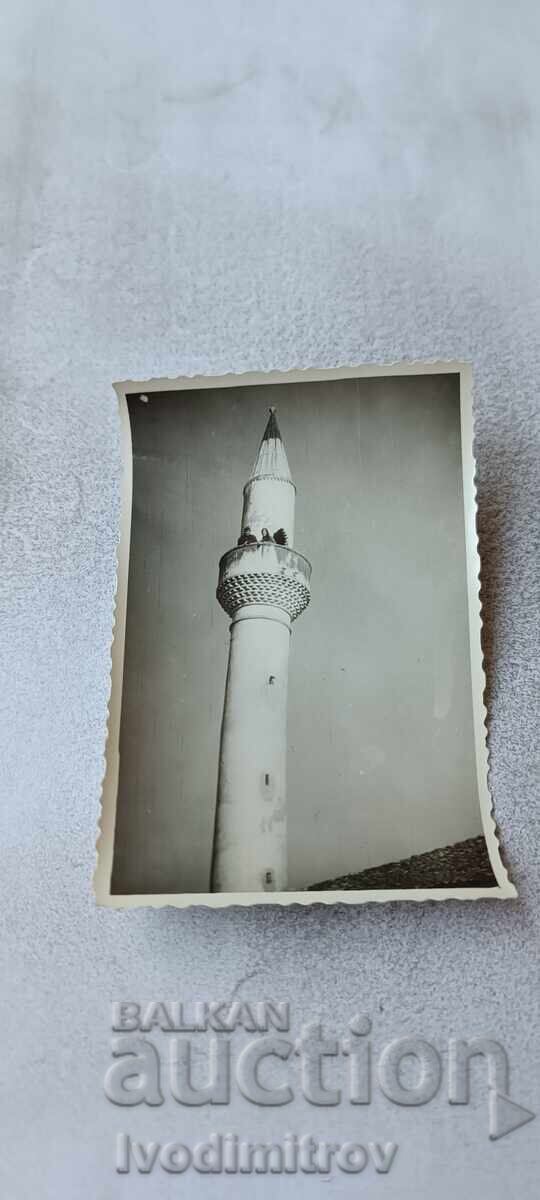 Fotografie Două fete tinere pe minaretul unei moschei