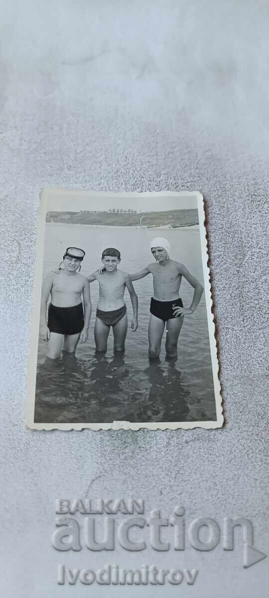 Photo Three boys in the sea