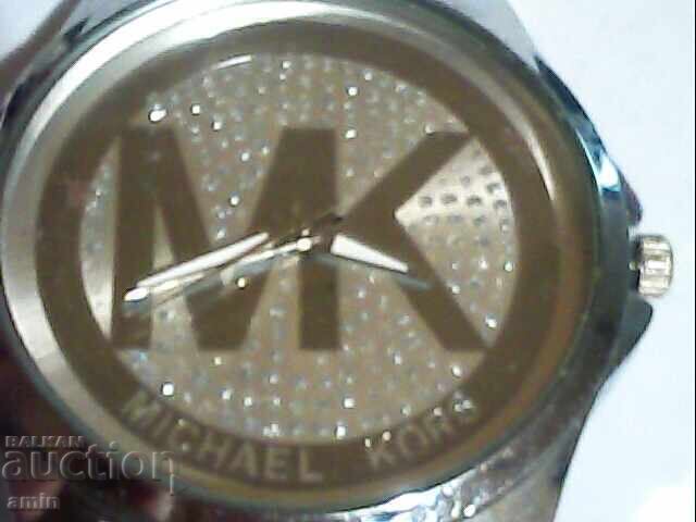Michel Kors watch, doesn't work, no battery