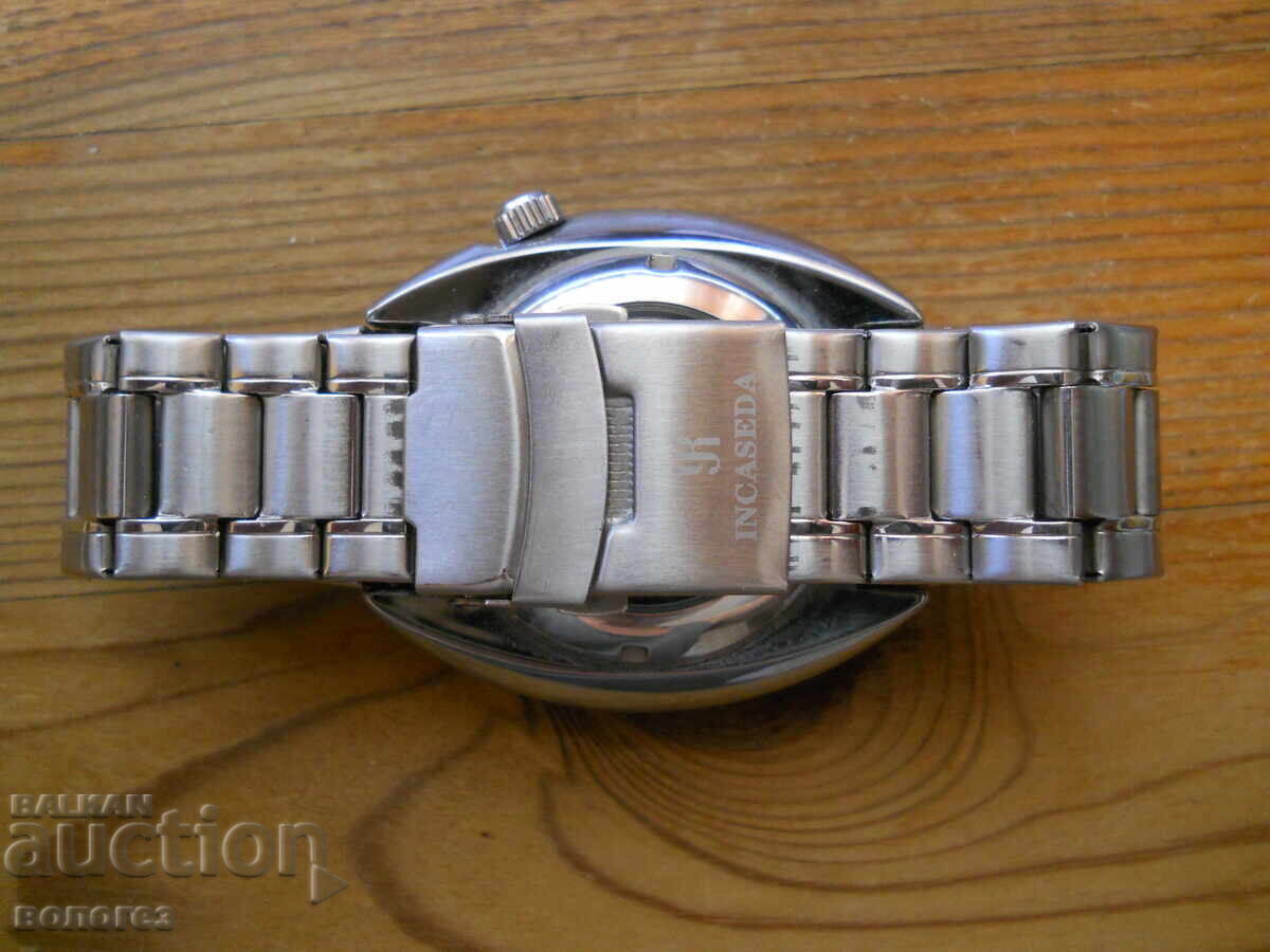 Livrarea Ceas automatic "Incaseda Diver" - funcțional Livrarea Ceas automatic "Incaseda Diver" - funcțional