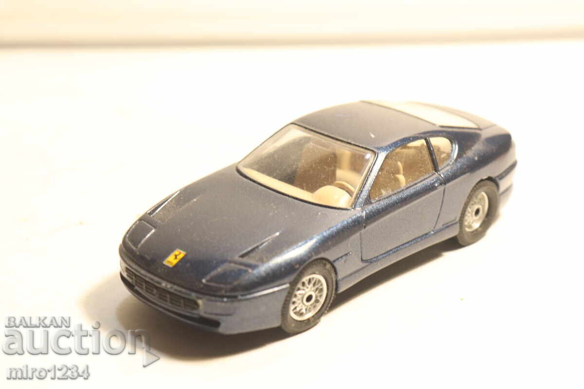 MODEL MAȘINUȚĂ FERRARI 1/43 BBURAGO