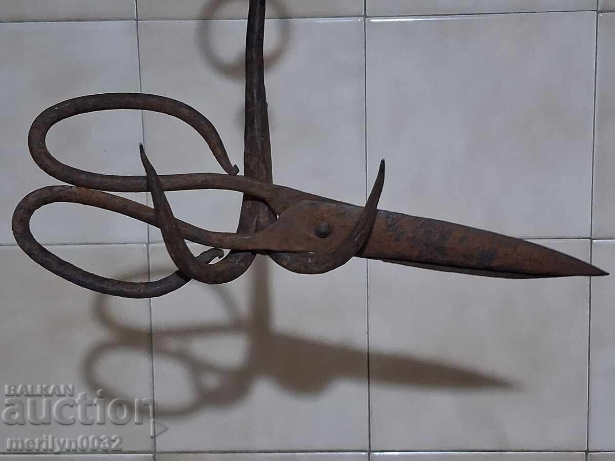 Old hand forged scissors, wrought iron