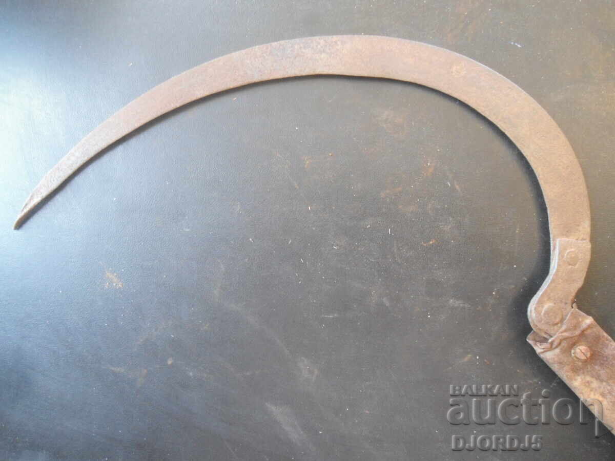Old sickle, marking
