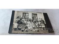 Photo: First-grade students with their teacher, 1932