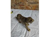 Old bronze figurine of a Siberian tiger