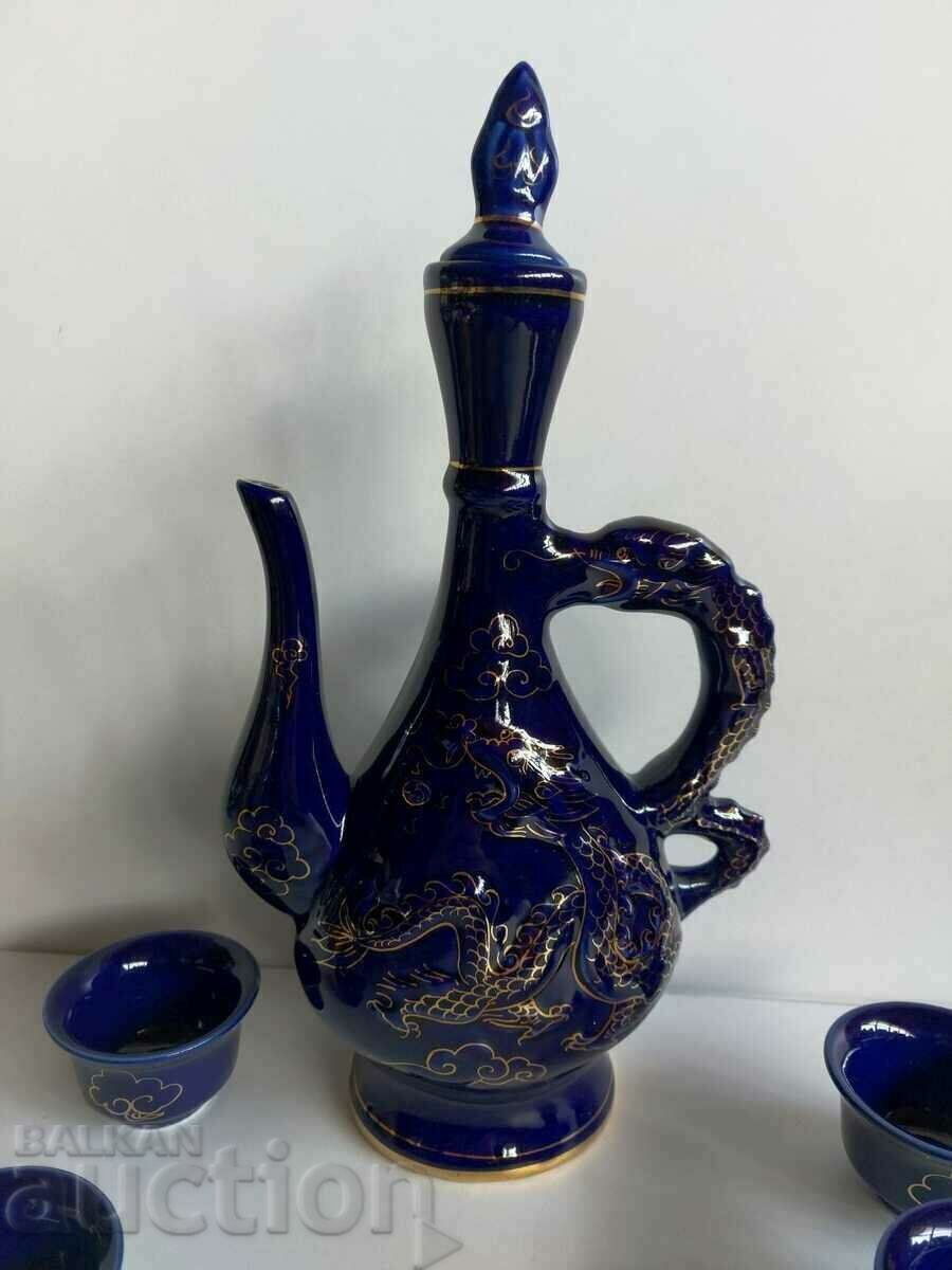 Livrarea PORCELAN CERAMICA MONGOLIA SERVICE CARAFE CANI COBALT VOS