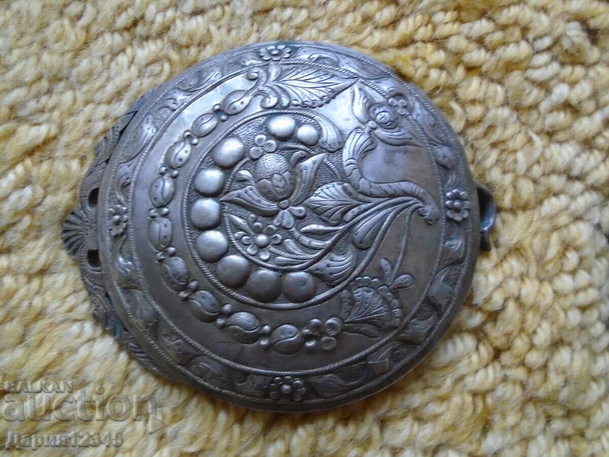 Auction Two similar silver belt buckle halves, part of a collection Auction Two similar silver belt buckle halves, part of a collection