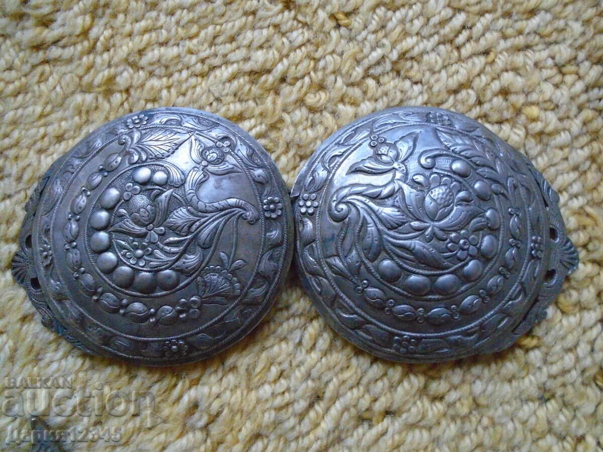 Two similar silver belt buckle halves, part of a collection Two similar silver belt buckle halves, part of a collection