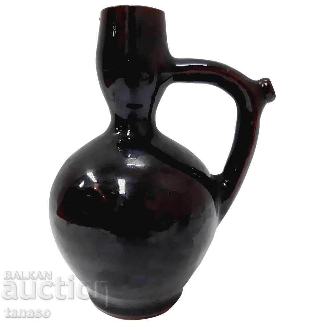 Vintage Trojan ceramic pitcher with dark brown glaze