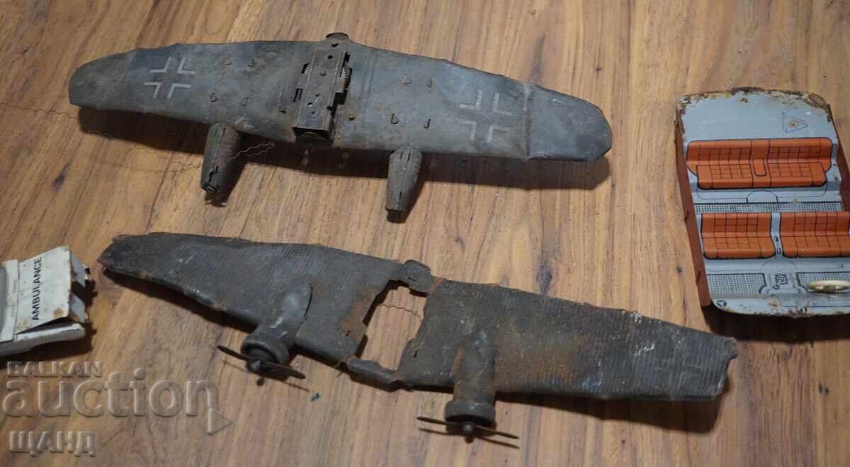 Delivery of Old German metal toys for parts airplane wings, car