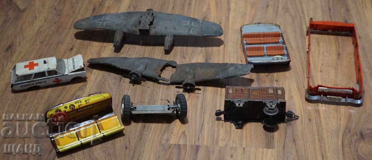 Old German metal toys for parts airplane wings, car