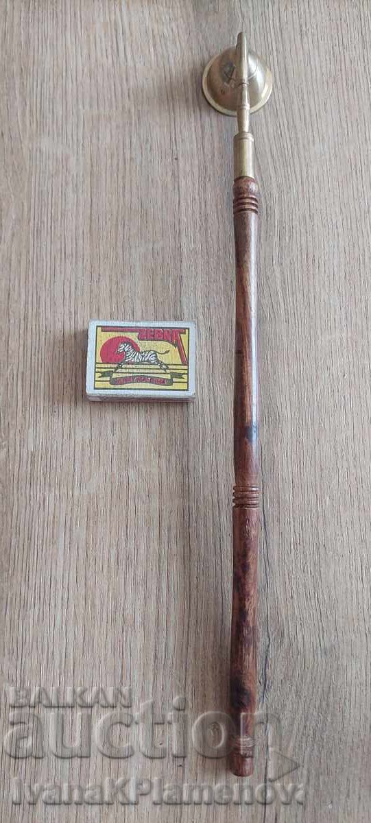 Delivery of Brass and wood candle snuffer for connoisseurs Delivery of Brass and wood candle snuffer for connoisseurs