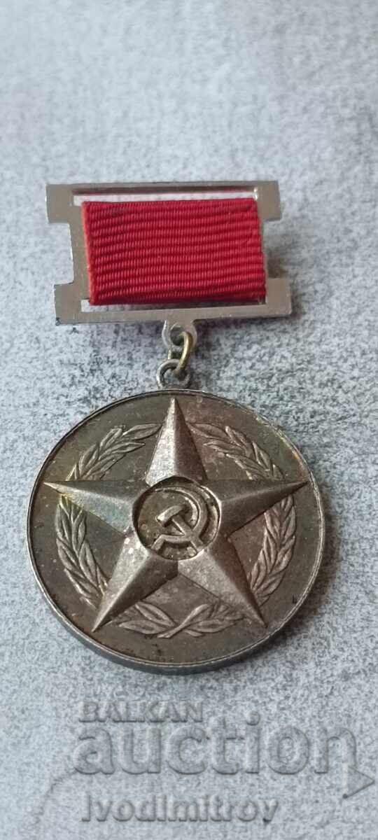 Значка За заслуги в областта на държавния и народния контрол