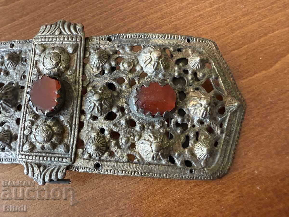Auction  Antique white metal belt buckles with red stones