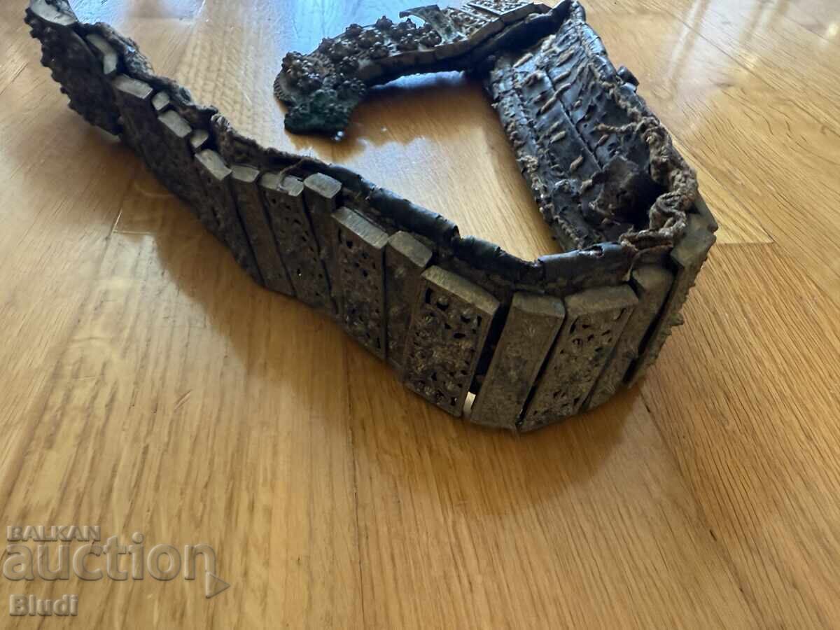 Auction  Old bronze belt about 75 centimeters long