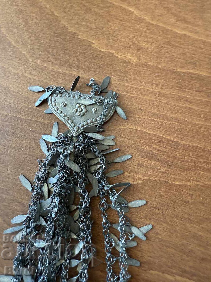 Auction  Old white metal pendant 29 centimeters