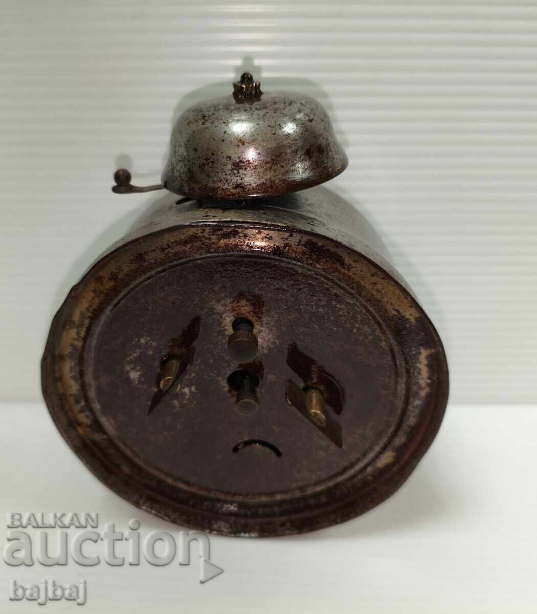 Auction  Old working alarm clock