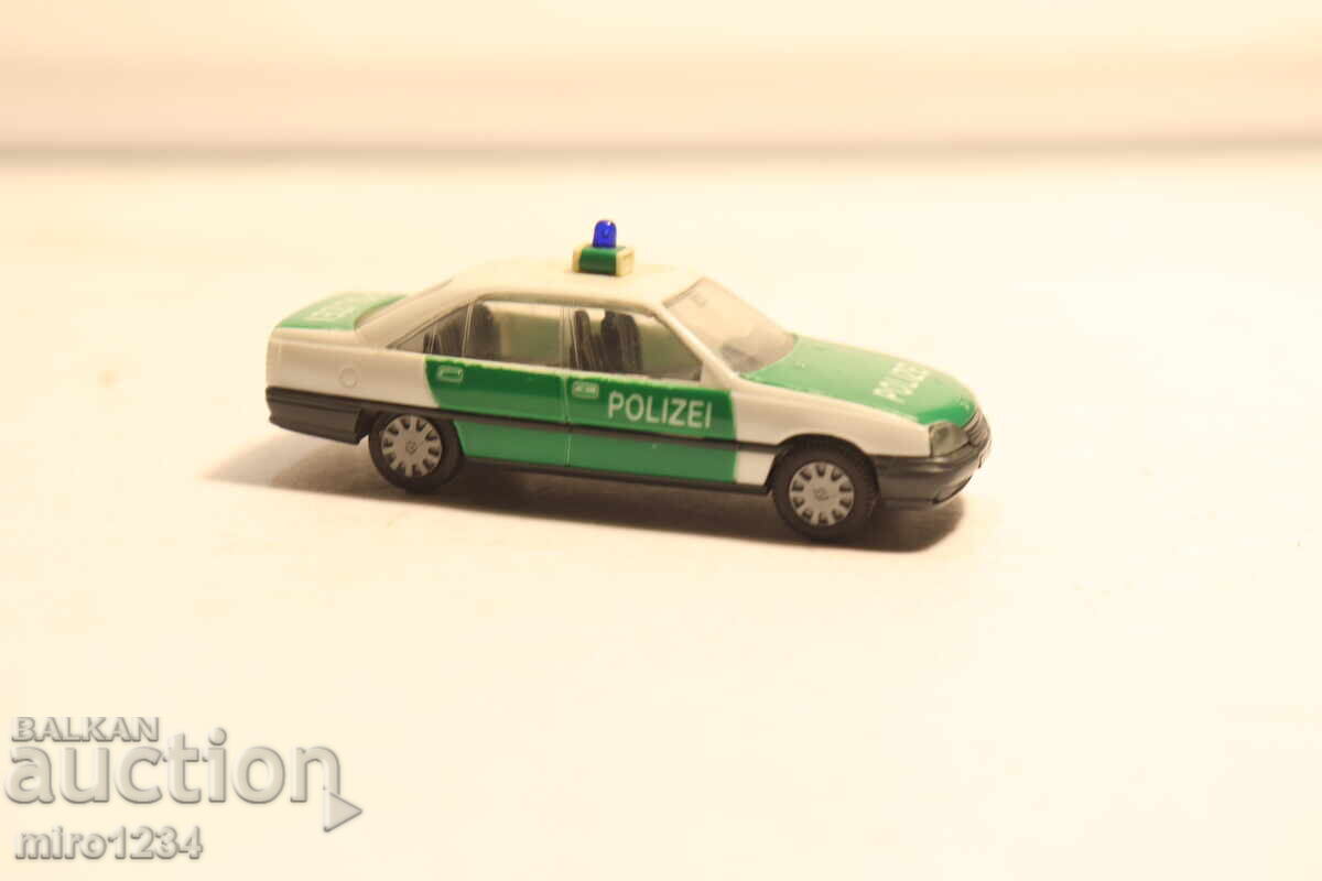 Licitație H0 1/87 HERPA OPEL OMEGA POLIȚIE MODEL MAȘINUȚĂ Licitație H0 1/87 HERPA OPEL OMEGA POLIȚIE MODEL MAȘINUȚĂ