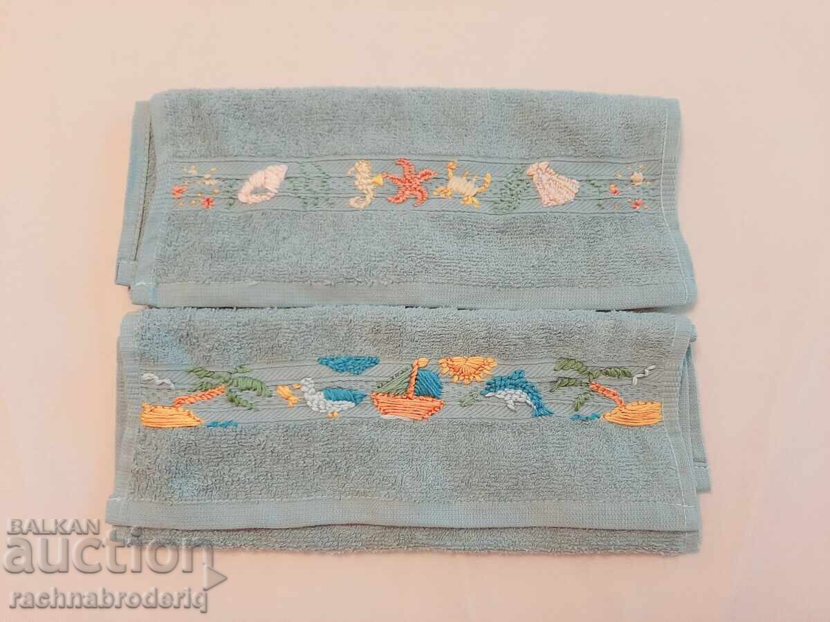 Delivery of Hand-embroidered towels with nautical motifs Delivery of Hand-embroidered towels with nautical motifs