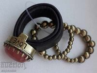 RING WITH HOOPS. BRONZE, LEATHER. NEW SET