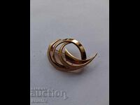 Gilded brooch