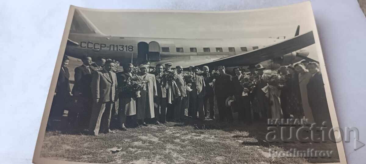 Photo: Welcoming an official delegation at a grass airfield