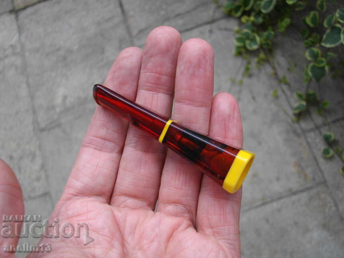 Auction  OLD AMBER CIGAR HOLDER