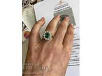 Ring with diamonds and emerald