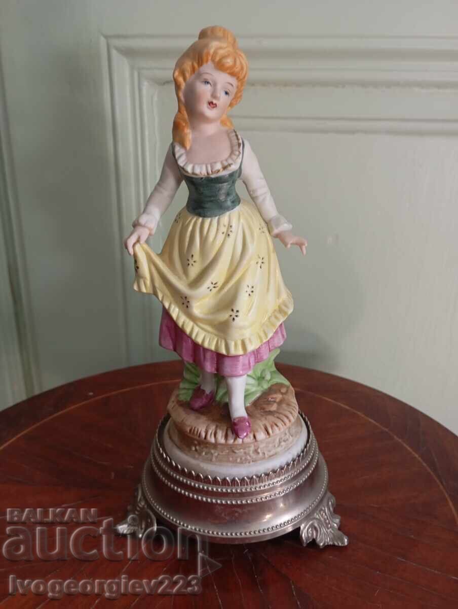 Porcelain figurine Porcelain figurine