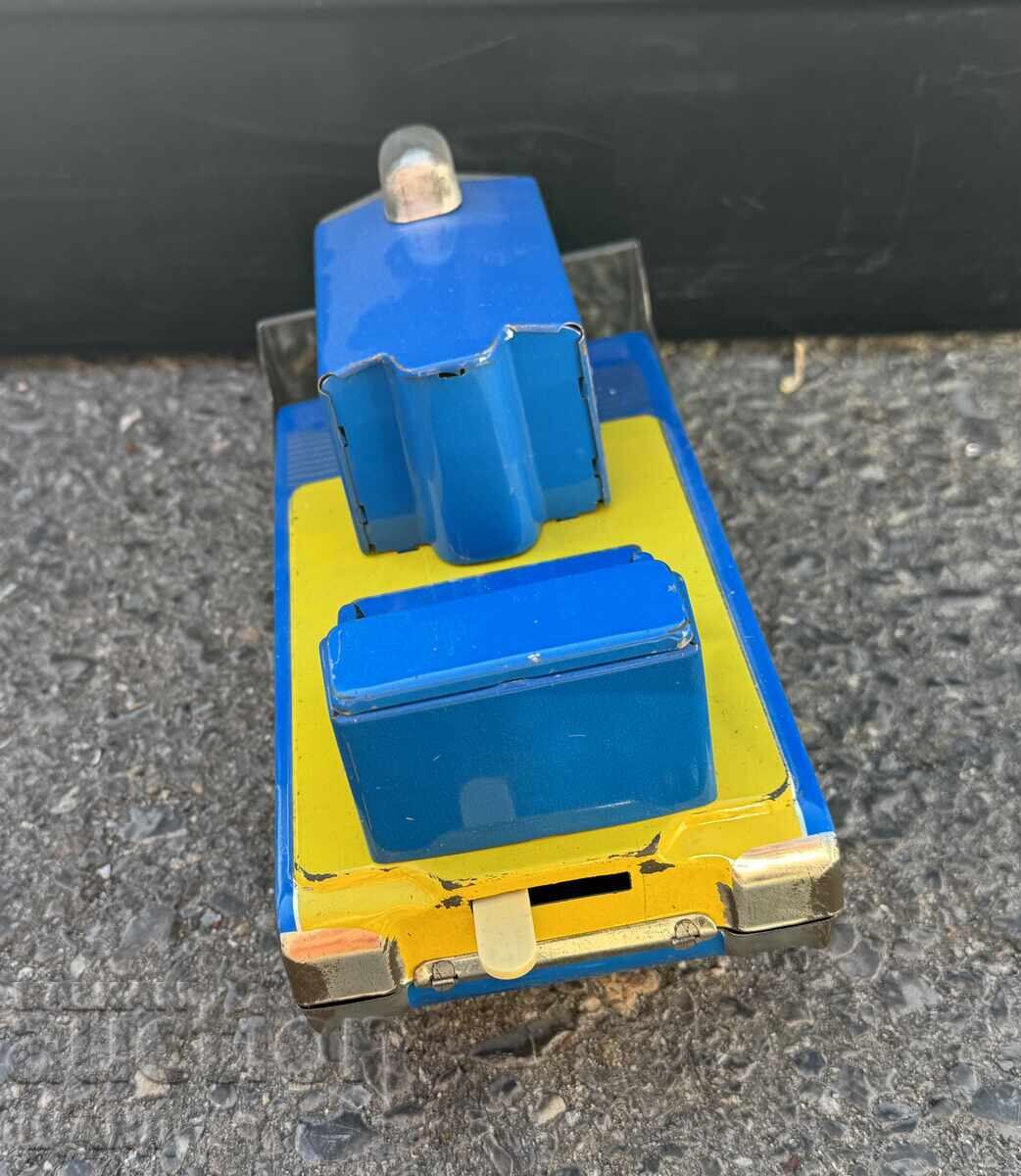 Delivery of Vintage Russian metal toy tractor bulldozer working