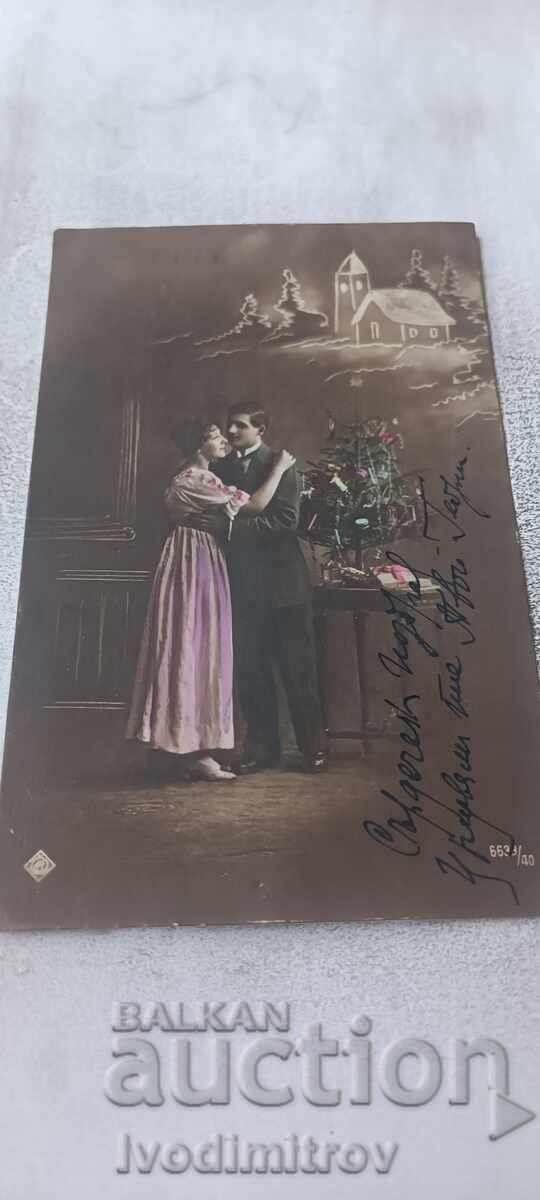 Postcard Man and young girl 1918