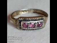 Silver ring with rubies in gilding