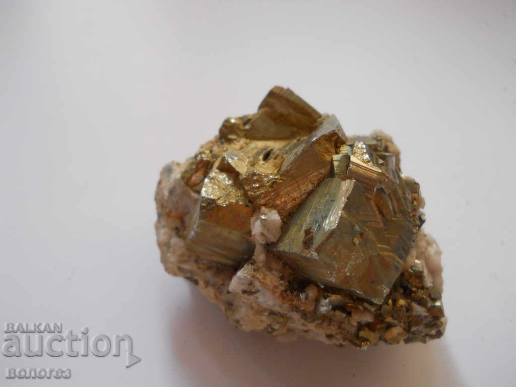 Auction  Calcite in pyrite - druse